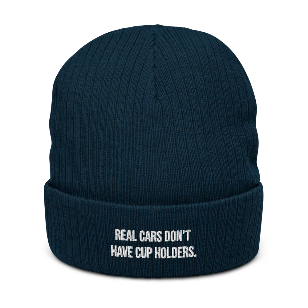 REAL CARS DON'T HAVE CUPHOLDERS.