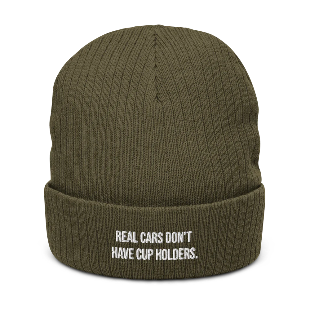 REAL CARS DON'T HAVE CUPHOLDERS.